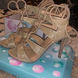 Gold glitter high heels
